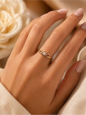 Gold Infinity Solitaire Ring - Elegant Women's Jewelry